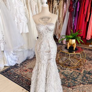 Ivory feather detail evening gown