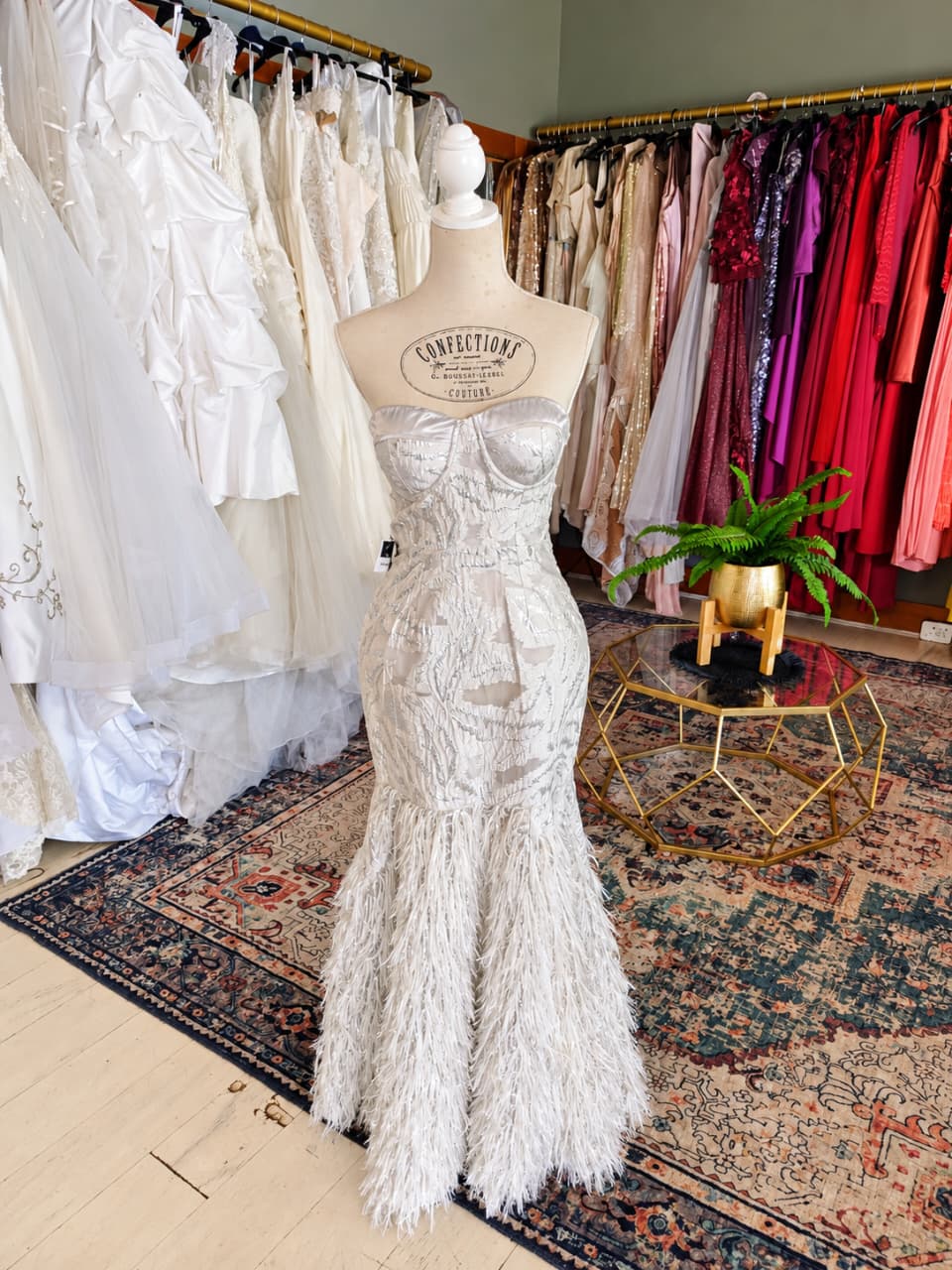 Ivory feather detail evening gown